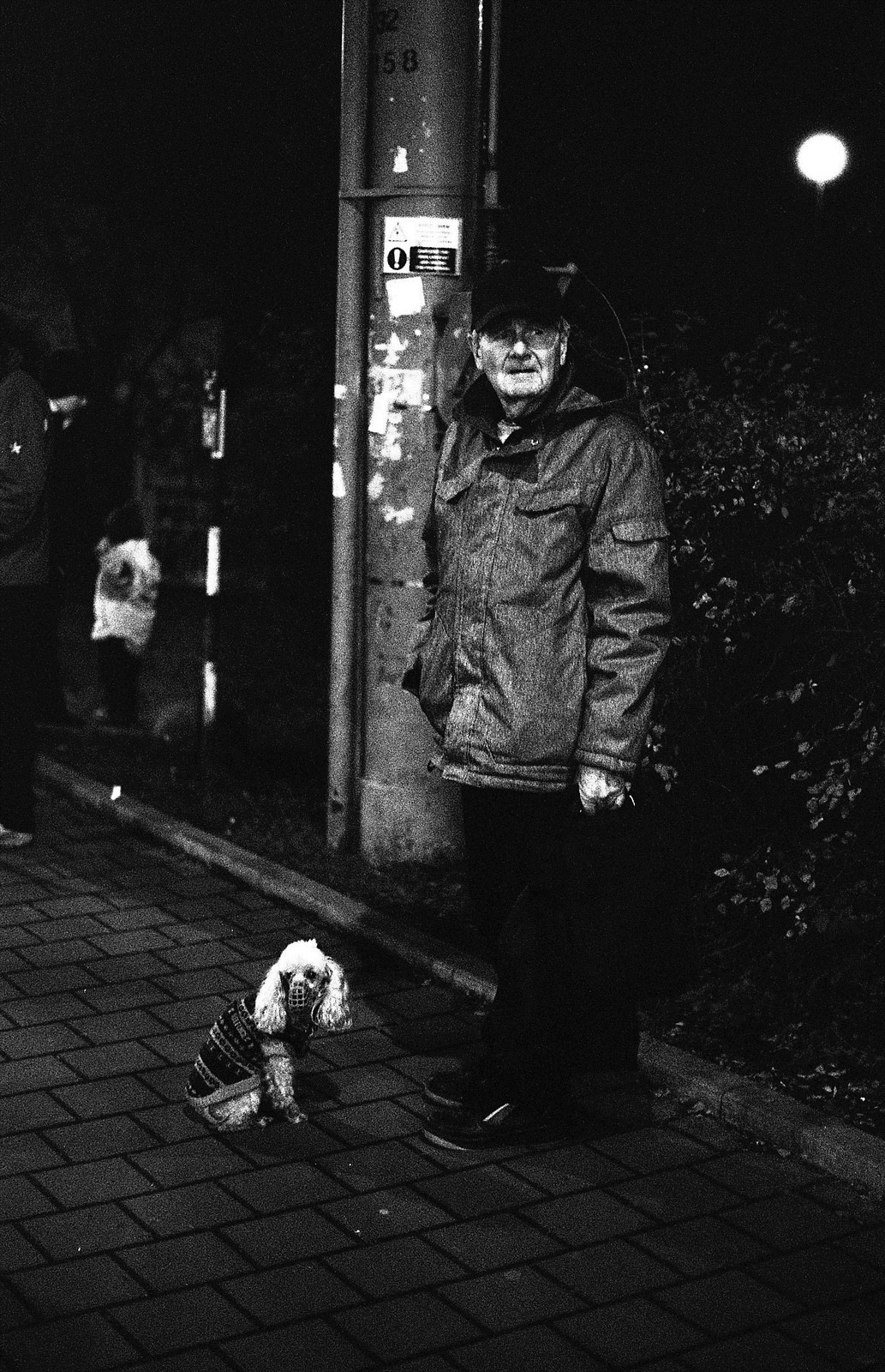 Canon Rebel XS - Man with a Little Dog at the Bus Stop