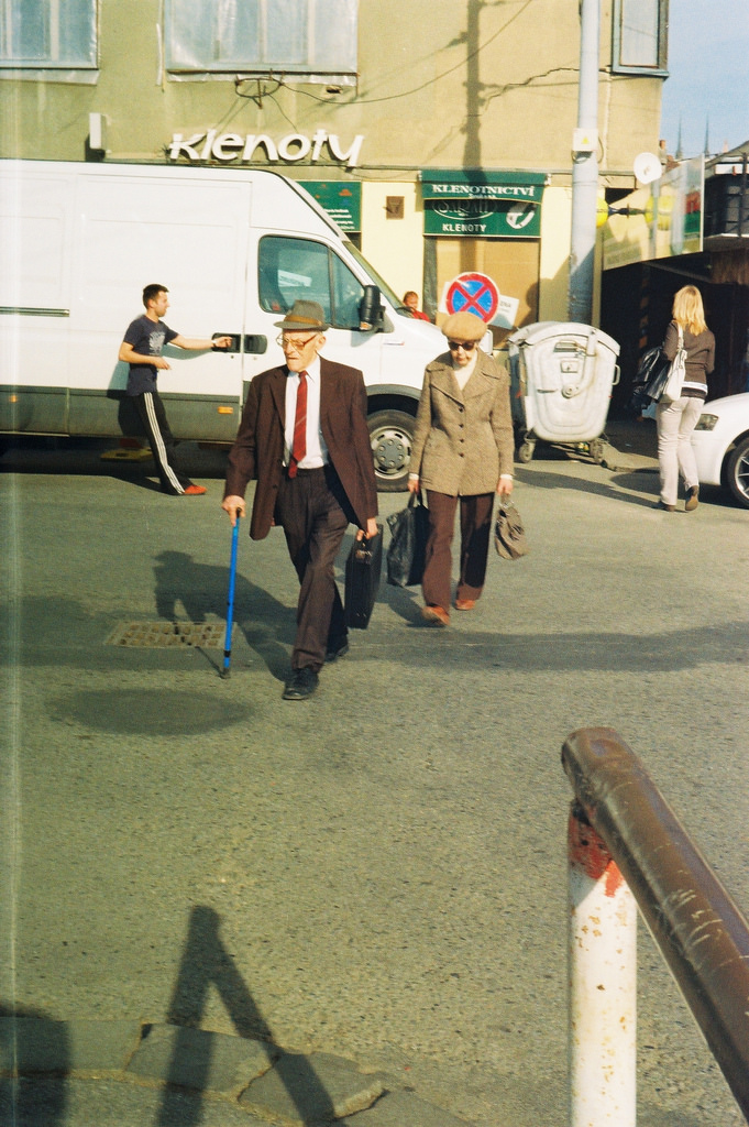 Beirette VSN - Elderly Couple Walking Towards the Bus